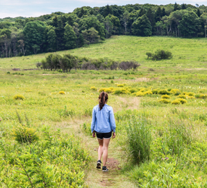 A hiker in Big Meadows Lodge at Shenandoah National Park