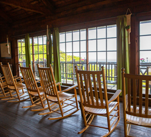A line of rocking chairs at Big Meadows Lodge