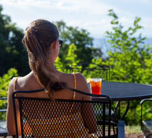 A Shenandoah visitor enjoying a drink outdoors