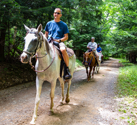 A group of guests horseback riding in Shenandoah National Park