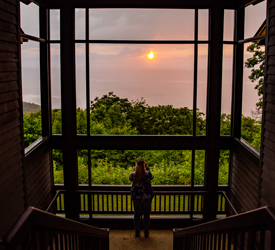 A Skyland guest capturing the sunset on her cell phone