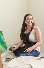 Artist Brie Austin teaching a painting class